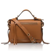 What bag to wear with knee high leather brown boots?