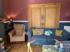 What colour walls with Navy and Copper/orange living room?