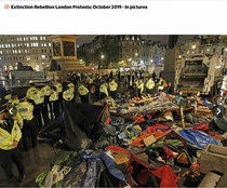 Protestors climb on train
