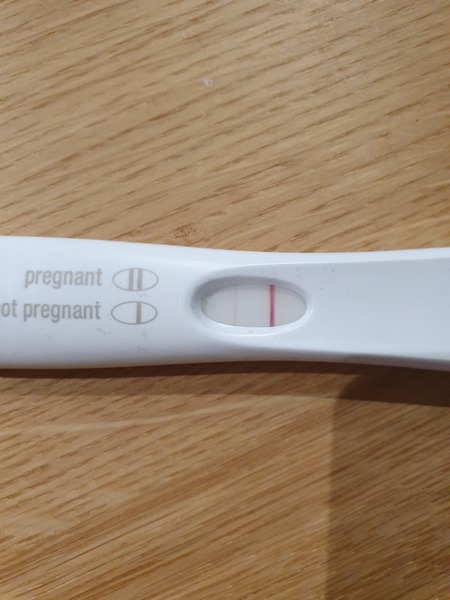7dpo tummy cramps