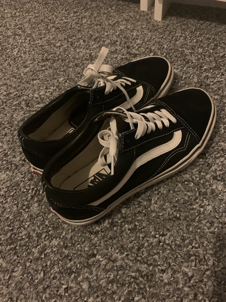 to wonder what the fuck this current obsession is with those black and white vans shoes?