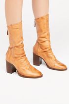 What boots go with cropped or tapered trousers?