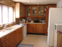 How much to get medium sized kitchen professionally spray painted?