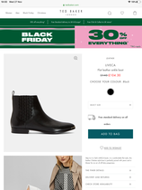 Feminine black flat Chelsea boots