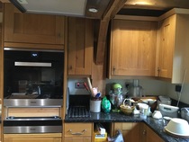 How much to get medium sized kitchen professionally spray painted?