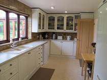 How much to get medium sized kitchen professionally spray painted?