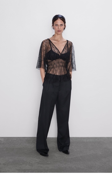 She was wearing a crochet top with no bra underneath