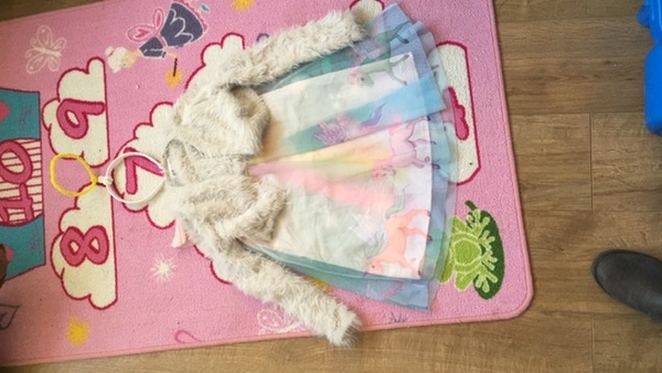 AIBU to send my daughter as a colourful angel?