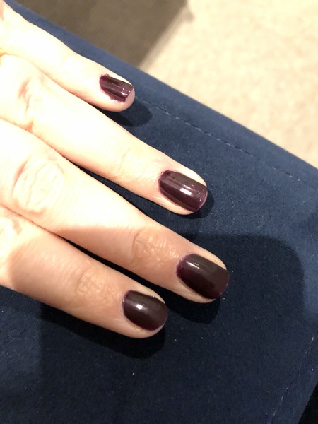 Why do 'nail tech' adverts show gaps at the bottom of the nail?