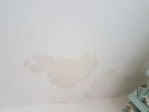 How to crack a bathroom tile to check for leak under bath? (with pics)