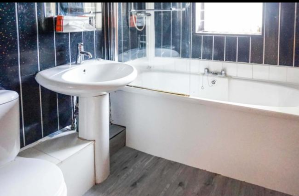 What can I do to make this god awful bathroom better?