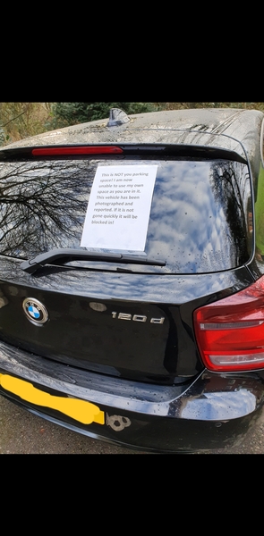 AIBU to stick a massive sign on CF car parked in my space?