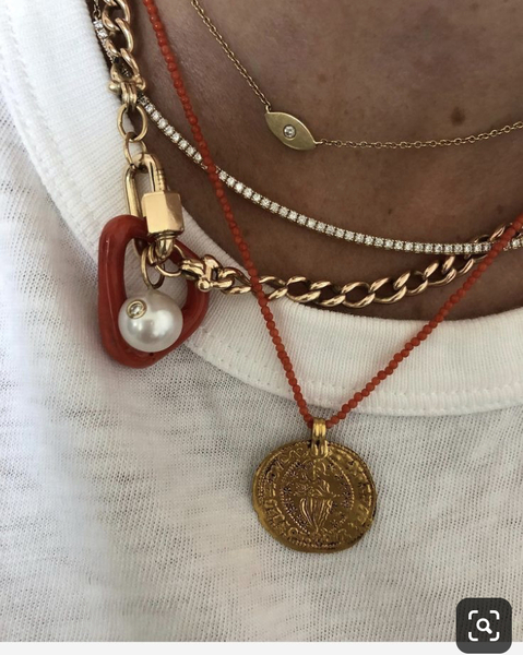 Are "statement" necklaces out of fashion?