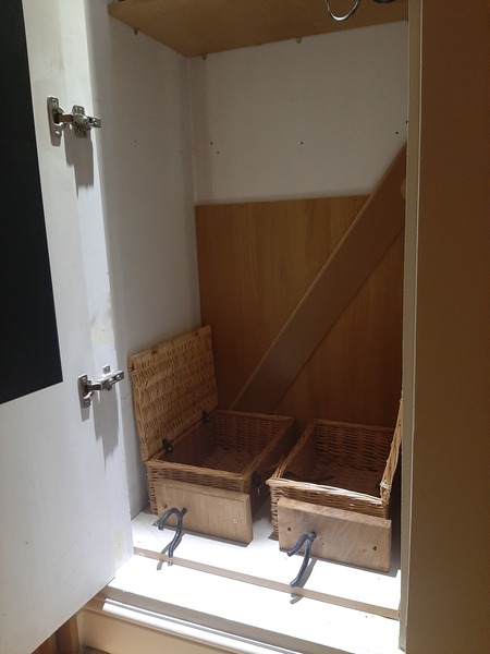 Ideas for hallway cupboard with toddler access