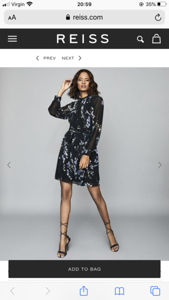 Is this too white to wear to a wedding?