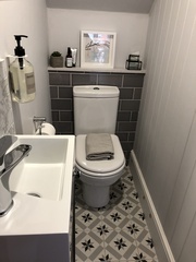 Removing (too small) downstairs loo and replacing it with a coats cupboard?