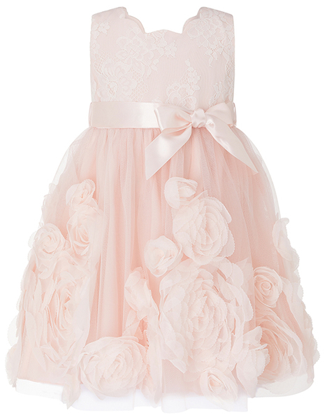 Child in a jumpsuit for wedding