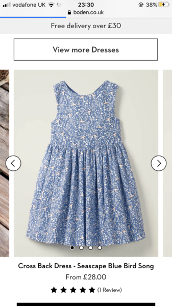 Child in a jumpsuit for wedding