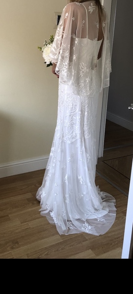 Please help me decide which (budget) wedding dress, photos attached.