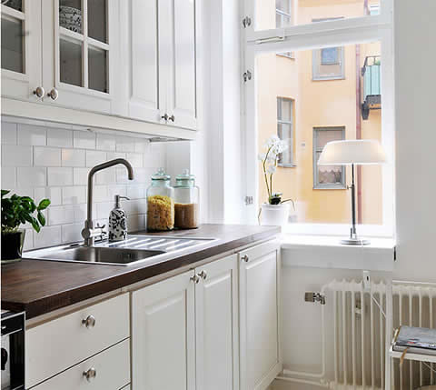 I want to repaint my kitchen doors but they're an ugly traditional design? What colour should I go for?
