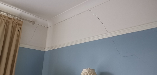 Opinions wanted on cracks in 1920's semi wall