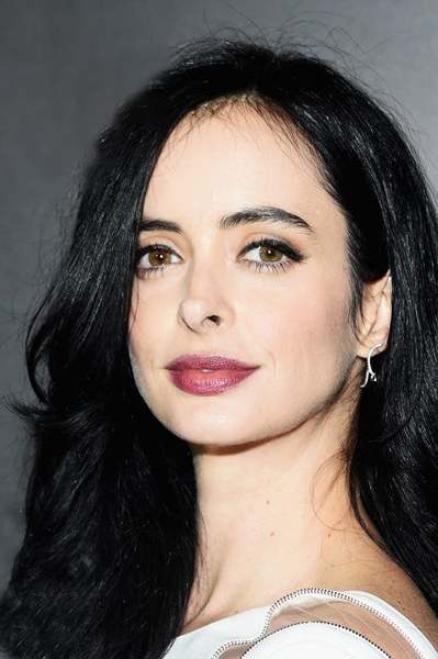 Pale with dark brown hair...