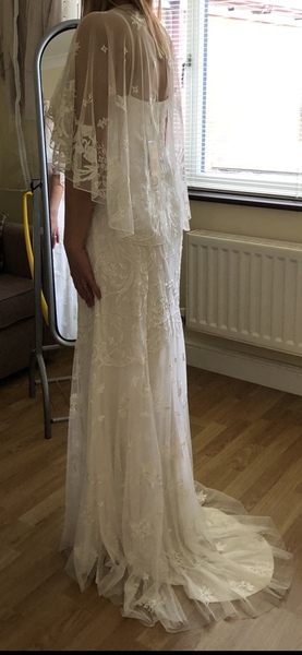 Please help me decide which (budget) wedding dress, photos attached.
