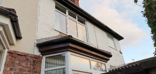 Opinions wanted on cracks in 1920's semi wall