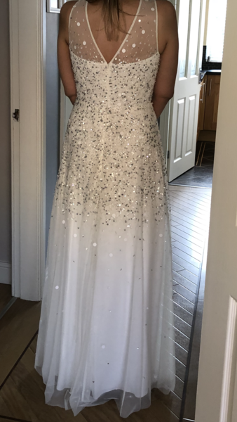 Please help me decide which (budget) wedding dress, photos attached.