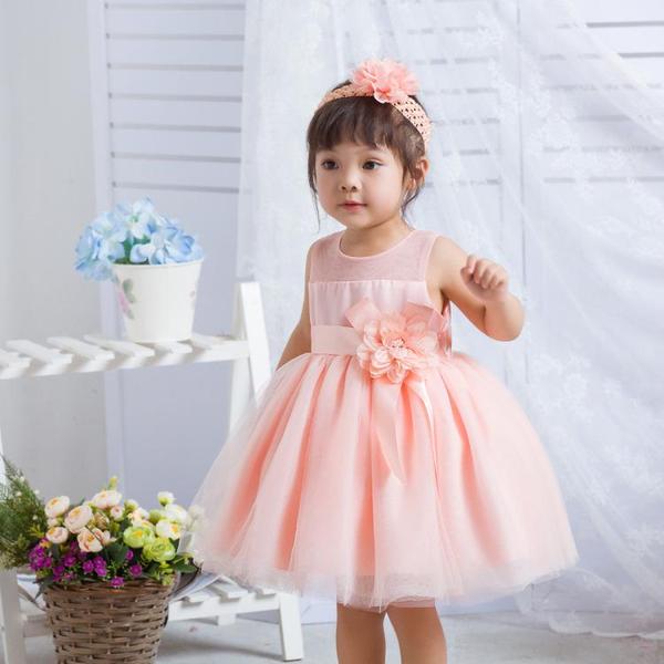 Child in a jumpsuit for wedding