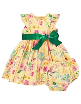 Child in a jumpsuit for wedding