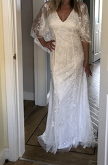 Please help me decide which (budget) wedding dress, photos attached.