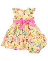 Child in a jumpsuit for wedding