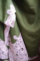Does anyone know anything about table linen/lace from Belgium/Rich's?