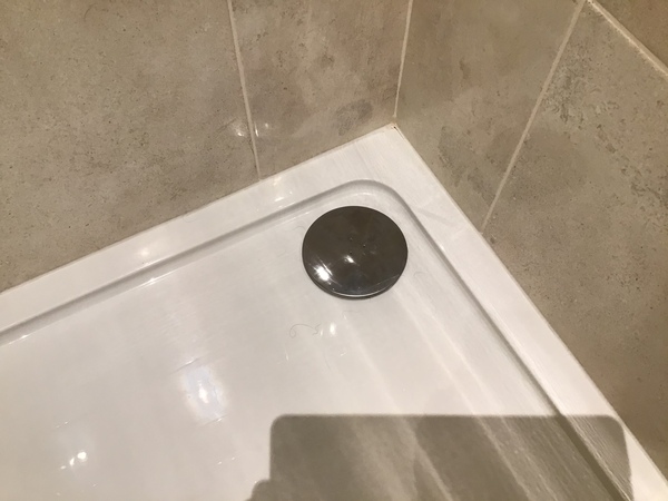 How do you clear this shower trap?