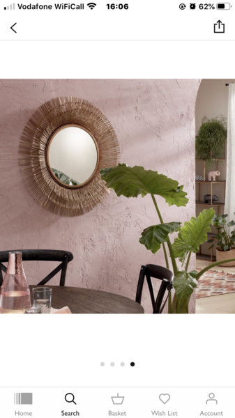 Does anyone have a round gold mirror above their fireplace?