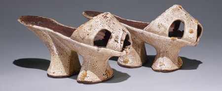 Are high heels used to make women weaker?