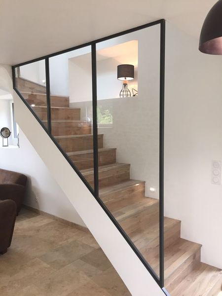 Which tradesman to talk to about a glass internal wall?