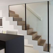 Which tradesman to talk to about a glass internal wall?