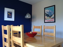 What colour of paint with dark navy wallpaper?