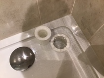How do you clear this shower trap?