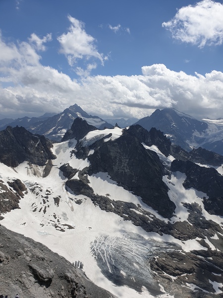 AIBU to ask for ideas for cheap holiday in place at lots of mountains?