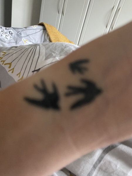 Husband says he will leave if I get a tattoo