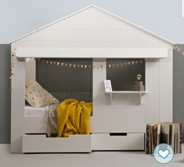 How can I decorate this bed for a boys room?