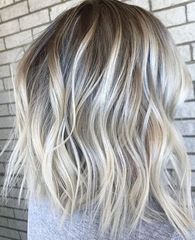 Lamenting the inevitable gap between how our hair should look and the actual reality