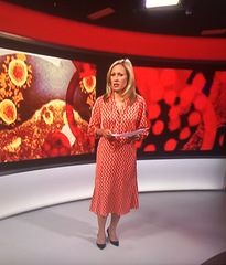 Sophie Raworth’s red dress on BBB News right now