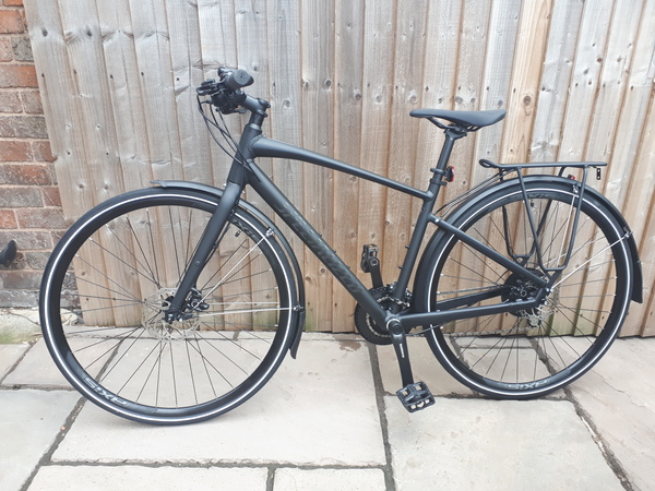 Getting on and off women's frame bike (especially in skirts)?