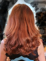 Hair looks lush from behind.. but