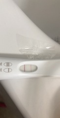 14DPO symptoms sharp pain when sneezing