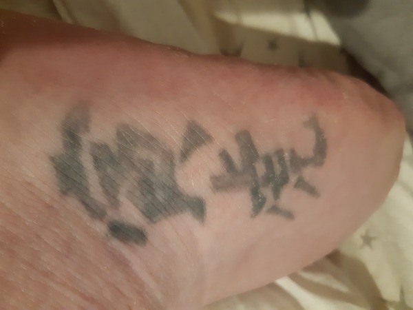 Chinese (we think, but could be Japanese) symbol help.